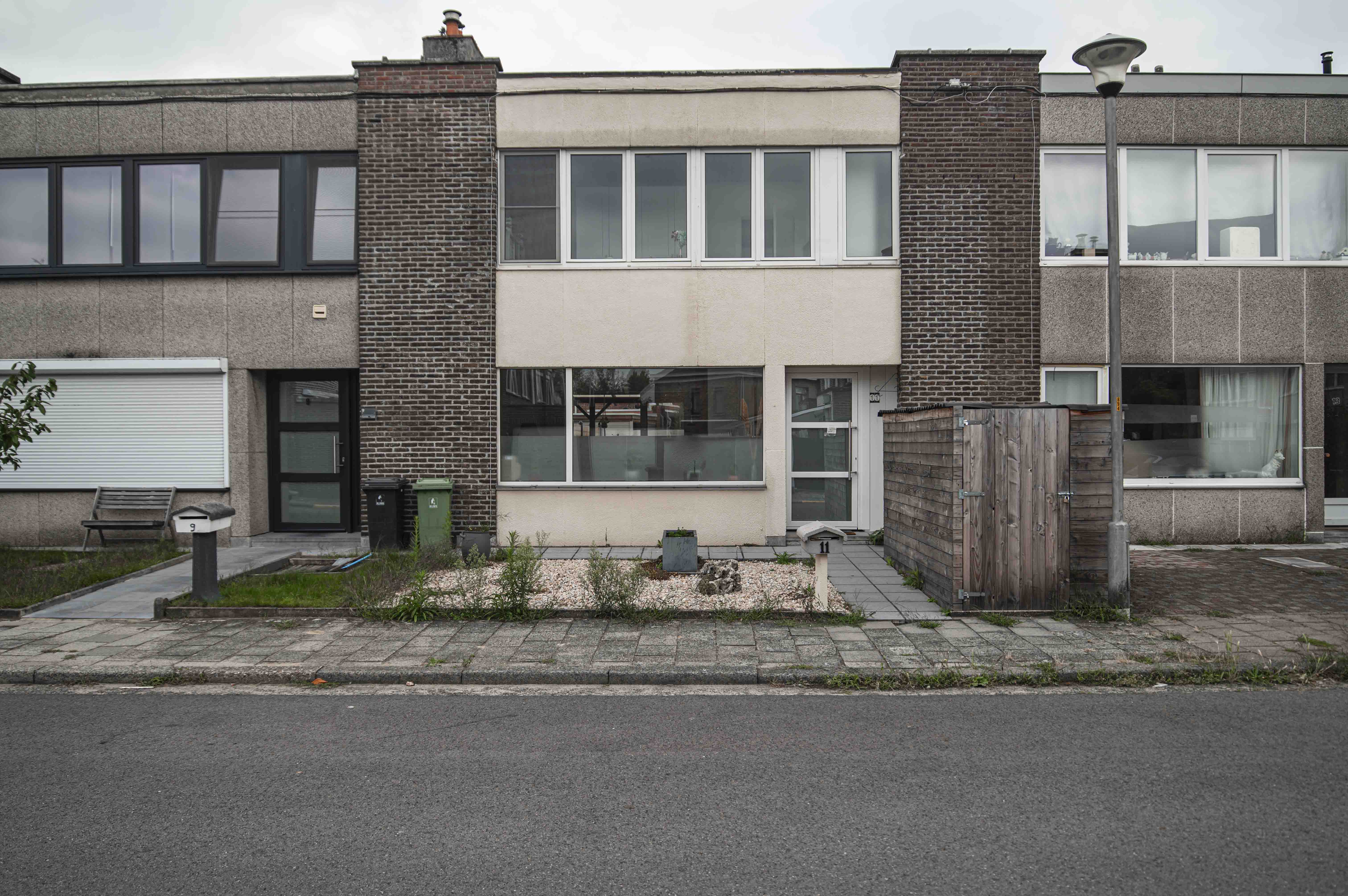 Gevelzicht woningen Adolf Daensstraat